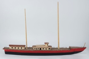 A folk art model boat, timber with painted finish, early to mid 20th century, 53cm high, 83cm long