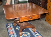 A Georgian drop-side mahogany two drawer table with pedestal platform base, early 19th century, 76cm high, 60cm (extends to 116cm) wide, 112cm deep