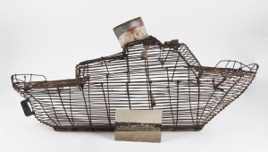 H.M.A.S. WANGANELLA PENNANT, No.45 wire work bird cage fashioned as a WW2 hospital ship, 93cm long. Together with an original black and white photograph of the WANGANELLA with numerous signatures verso of patients returning from New Guinea.