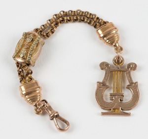 An antique Albertina fob chain in three tone rose, green and yellow gold, with lyre fob, 19th century, 13cm long, 10.7grams
