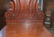 A Colonial cedar hall seat, scroll and acanthus leaf carved back rest with baluster and ring turned front legs, circa 1850. (after a design by Loudon 1833) ​​​​​​​86cm high, 39cm across the seat - 4