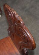 A Colonial cedar hall seat, scroll and acanthus leaf carved back rest with baluster and ring turned front legs, circa 1850. (after a design by Loudon 1833) ​​​​​​​86cm high, 39cm across the seat - 11