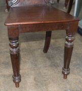 A pair of early Colonial Australian cedar hall chairs with finely carved shell backs and applied roundels, New South Wales origin, circa 1840, 87cm high. ​​​​​​​PROVENANCE: The Windeyer Family, New South Wales. - 11