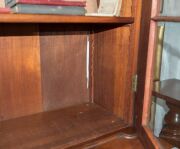 A Colonial Australian cedar bookcase with shield panel doors and turned columns, mid 19th century, 237cm high, 144cm wide, 54cm deep - 11