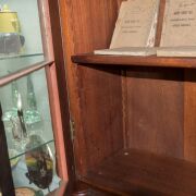 A Colonial Australian cedar bookcase with shield panel doors and turned columns, mid 19th century, 237cm high, 144cm wide, 54cm deep - 13