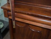 A Colonial Australian cedar bookcase with shield panel doors and turned columns, mid 19th century, 237cm high, 144cm wide, 54cm deep - 15