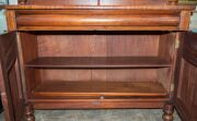 A Colonial Australian cedar bookcase with shield panel doors and turned columns, mid 19th century, 237cm high, 144cm wide, 54cm deep - 18