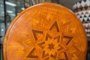 ANTON SEUFFERT (1815-1887) New Zealand, fine and rare tilt-top wine table with mottled Kauri tapering barley twist stem and three scroll legs, radiating starburst marquetry top with lozenge parquetry ground, inlaid with numerous native timbers, circa 1870 - 3