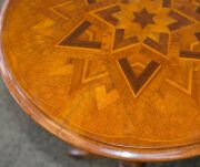 ANTON SEUFFERT (1815-1887) New Zealand, fine and rare tilt-top wine table with mottled Kauri tapering barley twist stem and three scroll legs, radiating starburst marquetry top with lozenge parquetry ground, inlaid with numerous native timbers, circa 1870 - 8