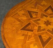 ANTON SEUFFERT (1815-1887) New Zealand, fine and rare tilt-top wine table with mottled Kauri tapering barley twist stem and three scroll legs, radiating starburst marquetry top with lozenge parquetry ground, inlaid with numerous native timbers, circa 1870 - 9