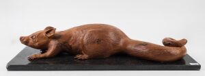 SILVIO APPONYI (1949 - ), Possum, carved Tasmanian huon pine on stone plinth, signed on the base "SILVIO APPONYI", 87cm long overall