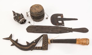 A lime spatula, snakeskin drum, carved wooden fishing lure, fish ornament and tortoise shell ornament, Papua New Guinea and Pacific Islands, (5 items), ​​​​​​​the largest 59cm long