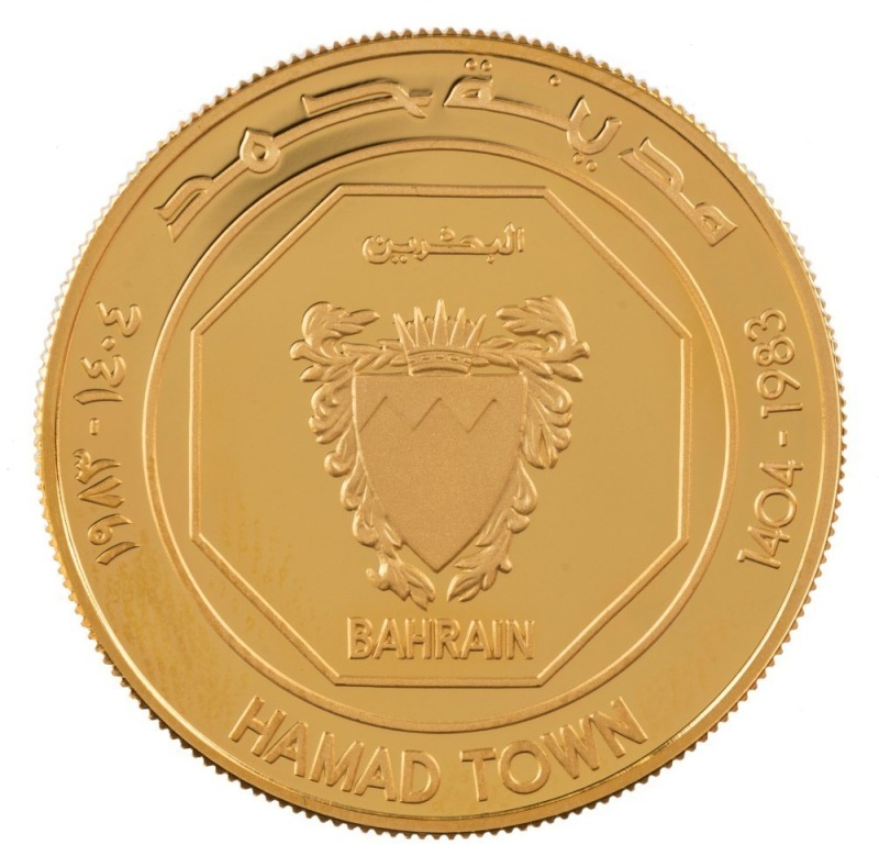 Coins - World: Bahrain: 1983 10 DINARS HAMAD TOWN PROOF GOLD COIN, 16gms, 22ct, in leather-bound case of issue. (issued in 1984).