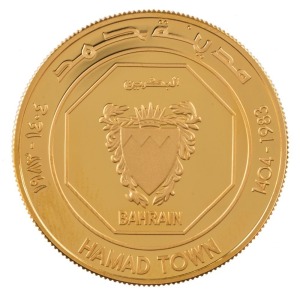 Coins - World: Bahrain: 1983 10 DINARS HAMAD TOWN PROOF GOLD COIN, 16gms, 22ct, in leather-bound case of issue. (issued in 1984).