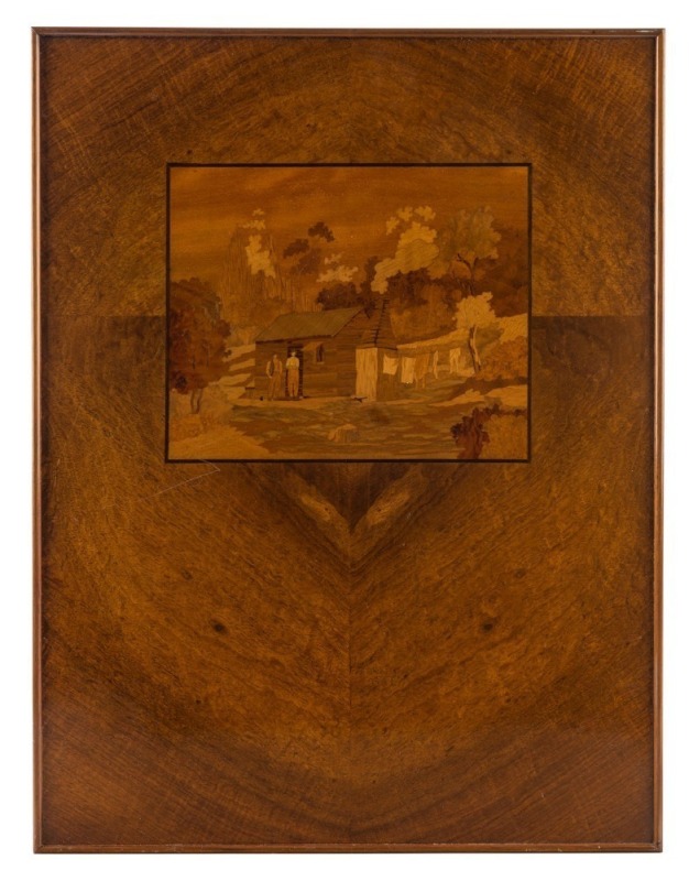 An Australian pictorial marquetry inlaid panel of a pioneers hut and figures in landscape, mounted in Queensland maple, 19th/20th century, 51 x 38.5cm overall