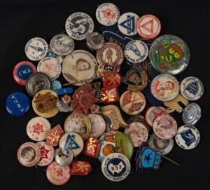 A duplicated range of badges, stick-pins, buttons, etc. (50+ items).