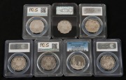 Coins - Australia: Queen Elizabeth II, a collection of individually slabbed and graded proof 50c pieces: 1976, 1979, 1983, 1987, 1999, 2004 & 2005. (7 items). - 2
