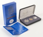 Coins - Australia: Decimal Proofs: 2001 Centenary of Federation three-coin (20c, 50c & $1) boxed PROOF sets for N.S.W., Victoria, Northern Territory, & Norfolk Island. (4 complete sets). - 3