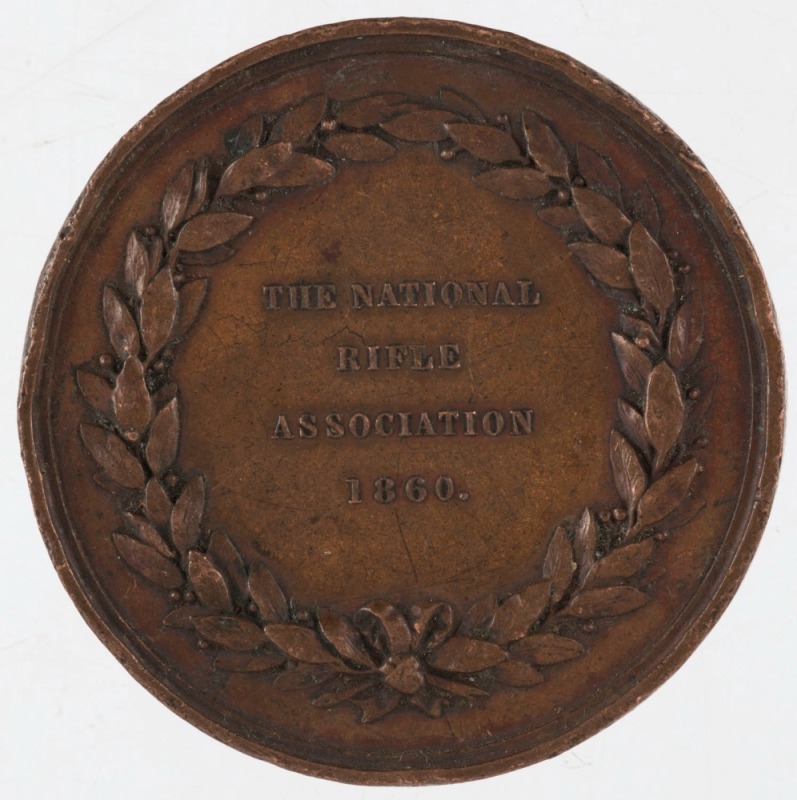 GREAT BRITAIN: The National Rifle Association 1860 bronze medal by G.G. Adams, depicting an archer and a rifleman, 48mm