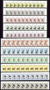 PAPUA NEW GUINEA:1964-65 (SG.61-71) 1d - 10/- Birds of Paradise: 10 sets in matching strips from the top of the sheets, MUH (110).
