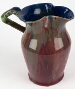 REMUED early pottery jug with lustrous pink glazed body, green handle and rich blue interior, incised "Remued 54Z", 25cm high - 3