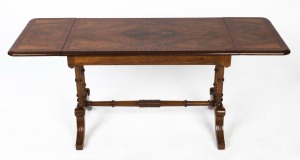 An English mahogany drop-side coffee table in the Georgian style, mid 20th century, purchased from Georges in Melbourne, ​​​​​​​51cm high, 76cm wide, 42cm deep