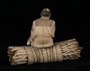 A Japanese carved ivory stature of the wood cutter, Meiji period, two character red seal mark to base, ​​​​​​​7cm high, 10cm wide - 3