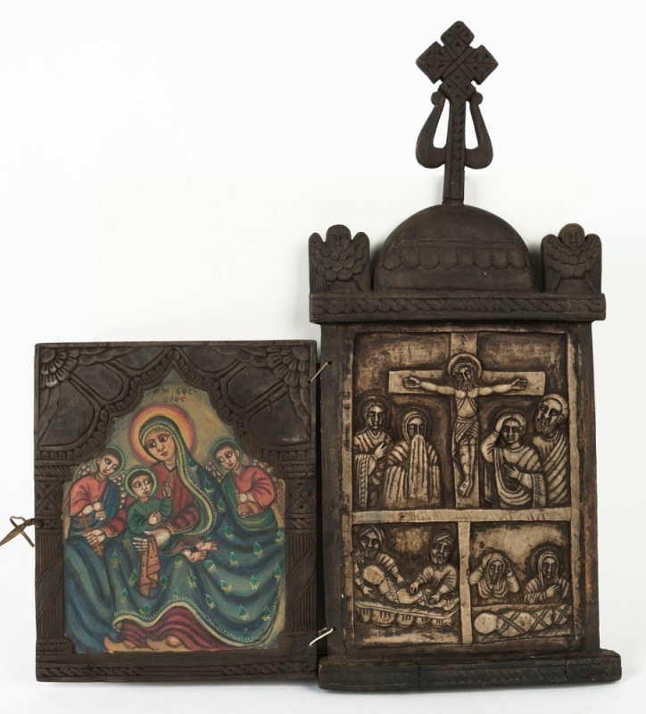 Ethiopian Orthodox diptych icon depicting the Mother of God and the crucifixion and entombment of Christ, hand-painted and carved wood, 20th century, 51cm high, 46cm wide