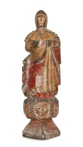 A Filipino religious statue of a female Saint, carved wood with polychrome finish, 19th century, 29cm high 