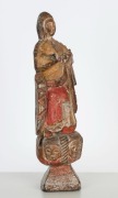 A Filipino religious statue of a female Saint, carved wood with polychrome finish, 19th century, 29cm high  - 2