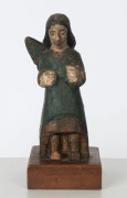 A Filipino angel statue, carved wood with polychrome finish, 19th century, Note: Missing one wing, later wooden plinth, 20.5cm high 