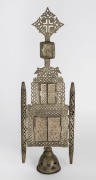 An Ethiopian Orthodox alter piece icon, bronze with silver finish and hand-painted panels depicting the Mother of God and various saints and angels, 19th/20th century, 63cm high overall - 2