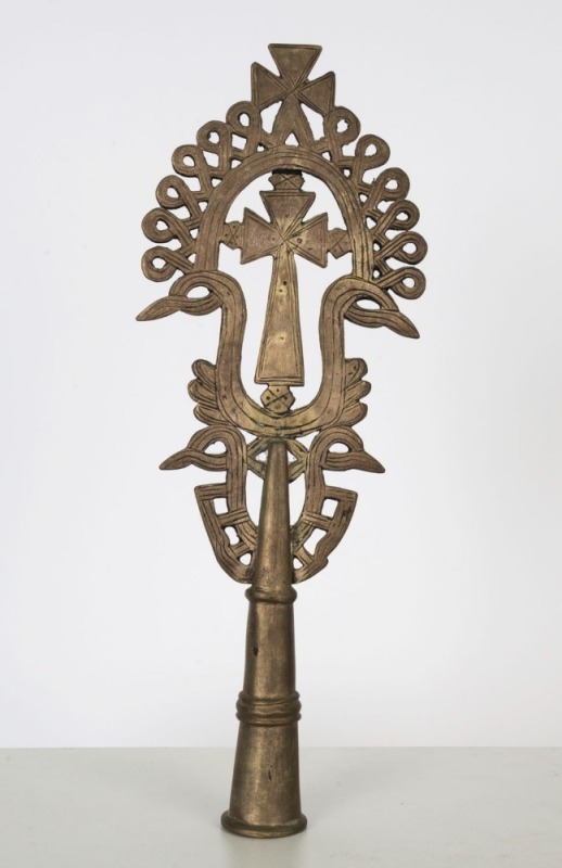 An Ethiopian Orthodox processional cross with birds head decoration, bronze and silvered finish, 19th/20th century, 35.5cm high