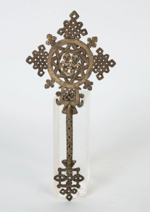 An Ethiopian Orthodox handheld crucifix, bronze with remains of silver finish, 19th/20th century, 28.5cm high