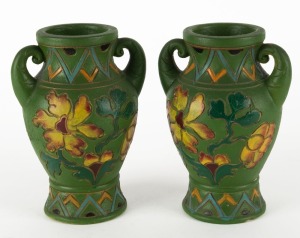 A pair of green ceramic vases, 20th century, 17cm high