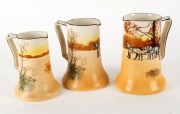 ROYAL DOULTON "Coaching Days" set of three graduated porcelain jugs, green factory mark to bases, ​​​​​​​the largest 17.5cm high - 2