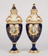 COALPORT&nbsp;pair of antique English porcelain blue and gilt vases, titles "ELLSMERE", and "ULLSWATER", painted by PERCY SIMPSON, early 20th century, green factory marks and titles to bases, ​​​​​​​22cm high