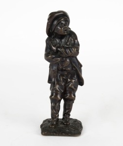 A bronze statue of a boy dressed in a frock coat and hat, 20th century, 17.5cm high