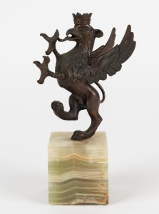 A vintage cast spelter statue of a rampant griffin, on green onyx base, 20th century, 19cm high