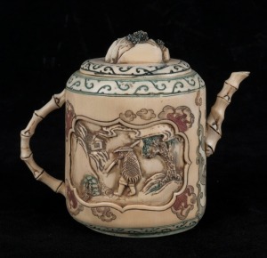 A Chinese carved ivory and hand-coloured miniature teapot, 19th/20th century, 9cm high, 9cm wide