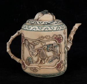 A Chinese carved ivory and hand-coloured miniature teapot, 19th/20th century, ​​​​​​​9cm high, 9cm wide