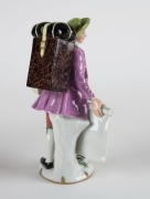 ROYAL VIENNA porcelain statue of the map man, 20th century, blue beehive mark to base, 17.5cm high - 2