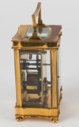 A French carriage clock in brass case with Arabic numerals, early 20th century, 15cm high including handle - 3