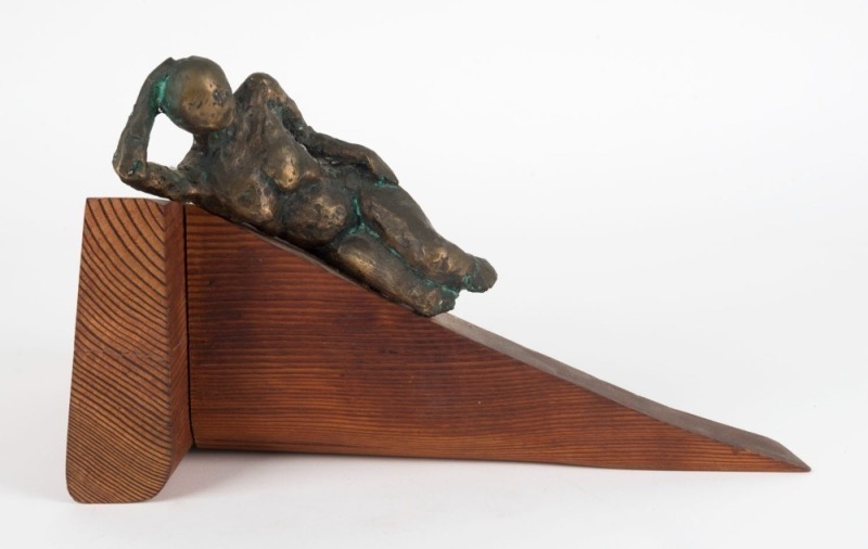 ARTIST UNKNOWN, (reclining nude), cast bronze and wood, 18cm high 