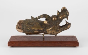 A Chinese bronze dragon handle, most likely from a sedan chair,  19cm long overall