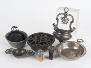 Antique pewter tastevin, wall font, wine strainer, decanter stopper and assorted dishes, 18th and 19th century, (7 items), the font 17cm high