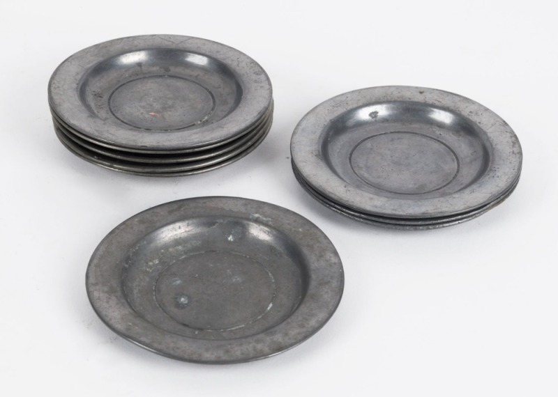 Nine assorted antique English pewter dishes, 18th/10th century, 10cm diameter