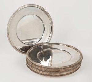 Set of 12 silver plated dinner plates, 20th century.  Ex Allan Moffat collection,  32.5cm diameter