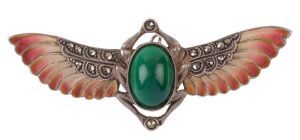 An Art Deco winged brooch, sterling silver, enamel, marcasite and greenstone, circa 1930, stamped "935", ​​​​​​​6.25cm wide