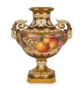 ROYAL WORCESTER English porcelain urn with facemask handles and hand-painted fruit, signed "TELFORD", 20th century, black factory mark to base, 22.5cm high